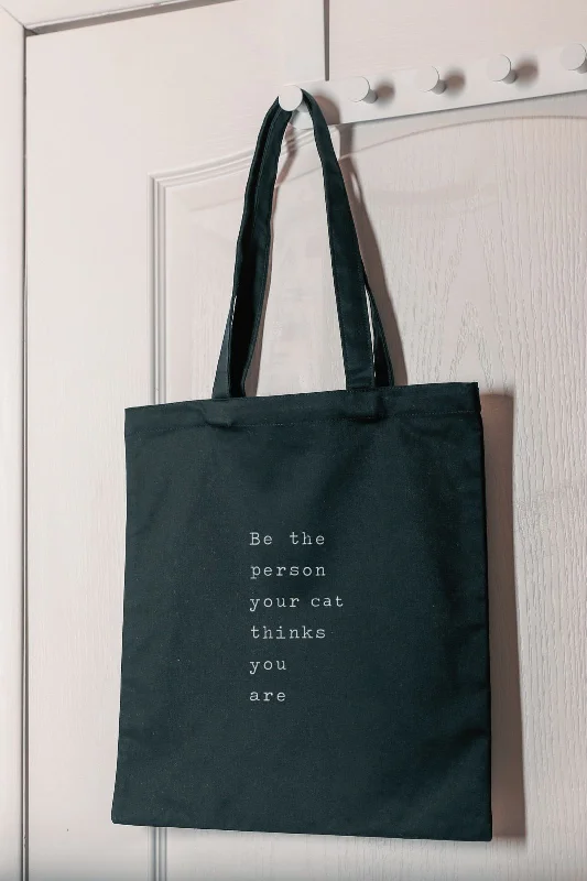 "Cat Thinks You Are" Tote Bag